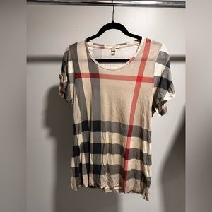 Burberry Check T Shirt
Women’s size Large
No signs of wear/holes